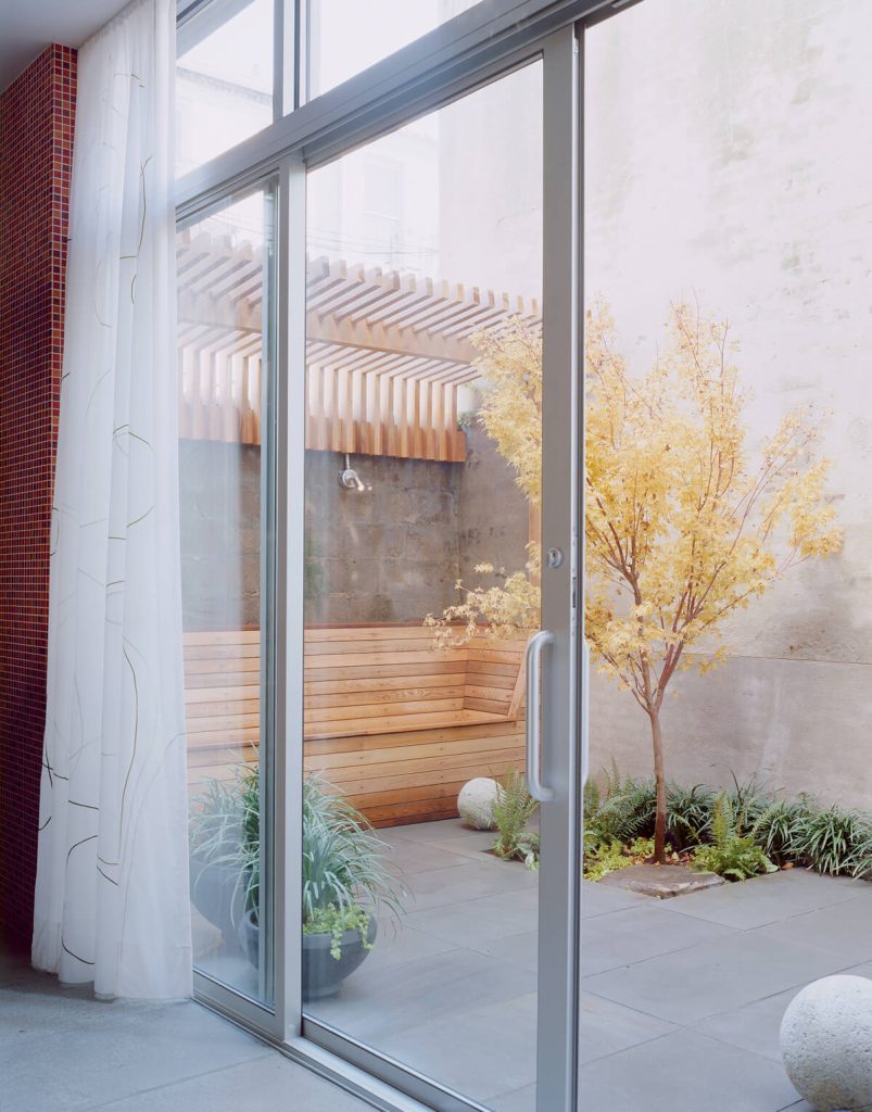 Carroll Gardens Row House outdoor room with built-in seating